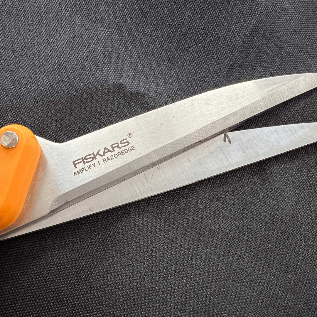 Close up of professional dressmakers scissors