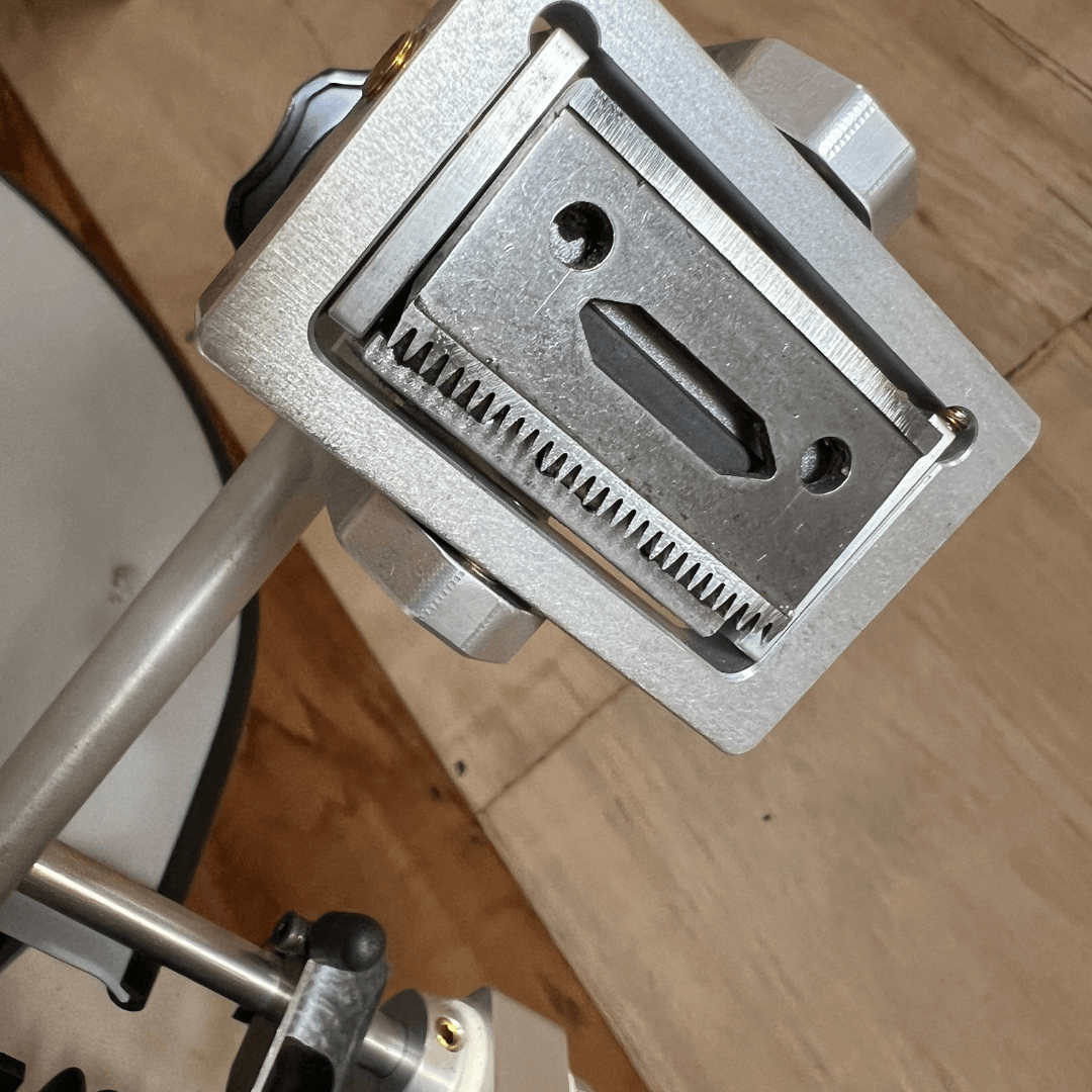 A clipper blade set up in the professional clipper machine ready for sharpening